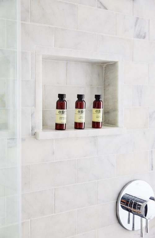 Bathrooms feature marble baths and rain showers / Read McKendree