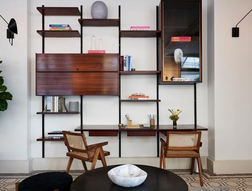 Features include mid-century Osvaldo Borsani rosewood shelving / Adrian Gaut
