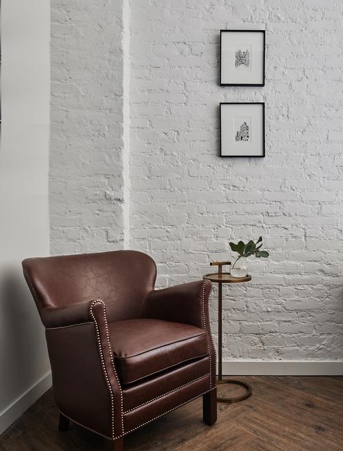 There are tobacco leather professor chairs in each of the rooms / Adrian Gaut