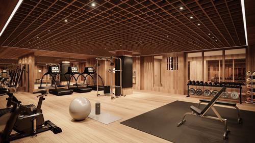 The fitness centre in the House is replete in wooden floors and walls / Noe & Associates / The Boundary