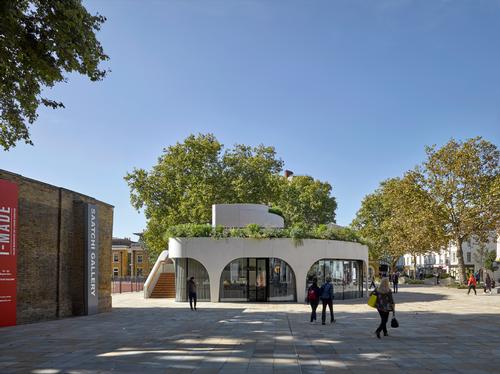 Large arches around the outside give the structure a pergola-like form / James Brittain