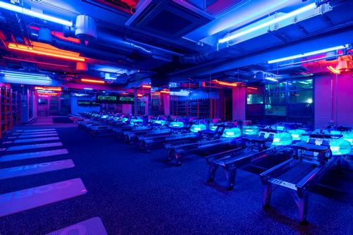 Nulty created a bold lighting design for Rowbots gym defined by contrasting tones of blue and amber in the underground space / Sarah Mannerings Studio