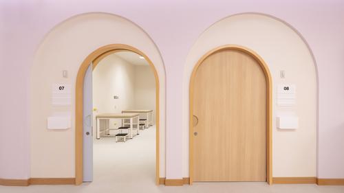 The design language is drawn through into elements like curved doorways / Ketsiree Wongwan