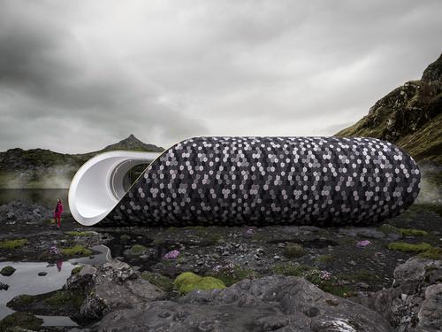 The volume is clad in half circles of recycled wood that have been fixed and arranged together to form a scale-like pattern / Wafai Architecture