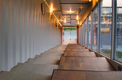 Terrace seating has been built into the stairs of the café / Rahul Jain