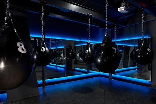 Nightclub-like lighting and music in the studio are intended to foster a motivational atmosphere for training classes / Clarence Butts