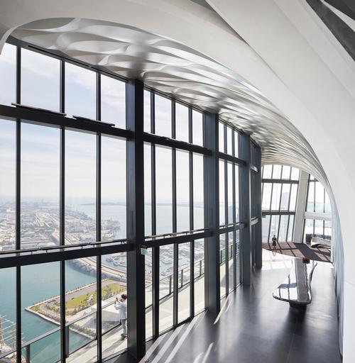A sky lounge with views of the surrounding areas provides space for relaxing and hosting events / Hufton+Crow