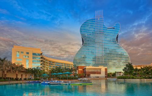 Floor-to-ceiling windows throughout create a gleaming glass frontage / Hard Rock