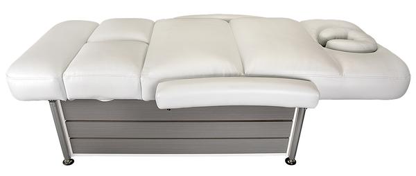 The foot soak tub disappears under the convertible table