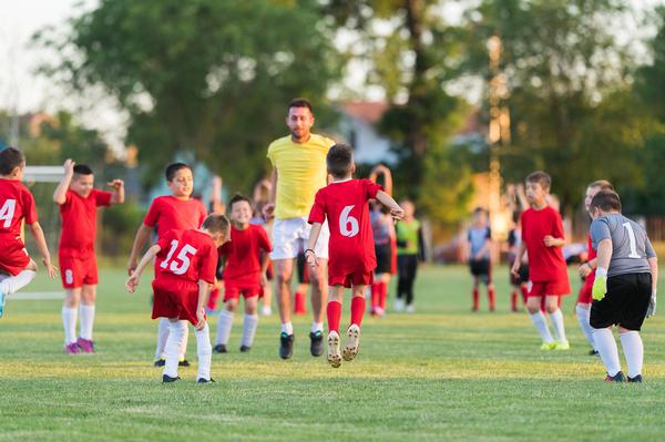 Volunteers in sport are more likely to feel good about their community / shutterstock/Fotokostic