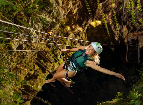 One of the experiences sees visitors descend to the inside of a cavern with an assisted rappel