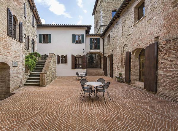Solomeo’s medieval squares and roads have been repaved and restored, with a range 
of new amenties added