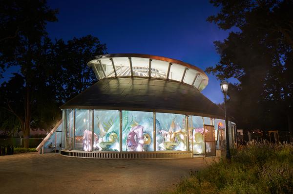 The Sea Glass Carousel in Battery Park, Manhattan, elevates the traditional carousel into a digitally-enhanced aquatic journey