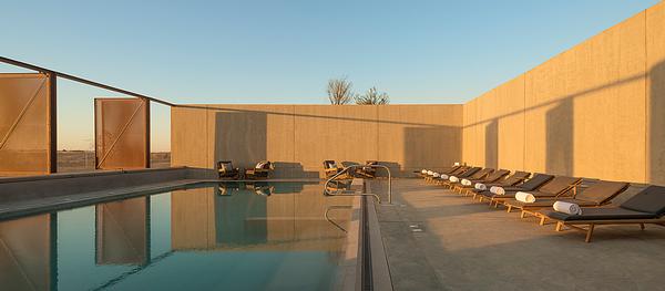The Al Fayha Lodge is a desert oasis in Sharjah with stunning signature pool