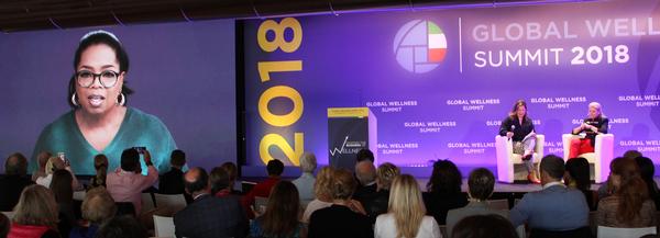 Excitement rippled through the audience when celebrities such as Oprah Winfrey addressed delegates via video 