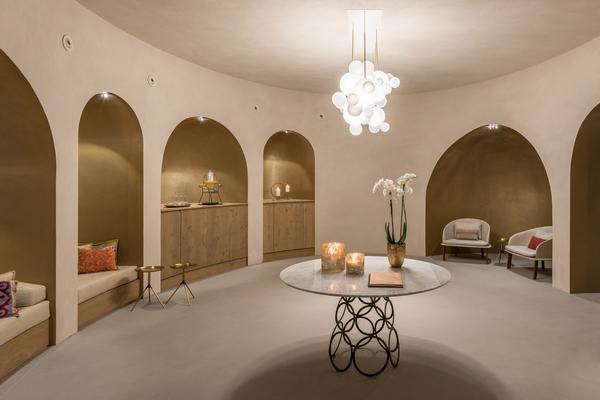 The interiors of the Euphoria Retreat include many vaulted ceilings and arches, reflecting the design of local churches