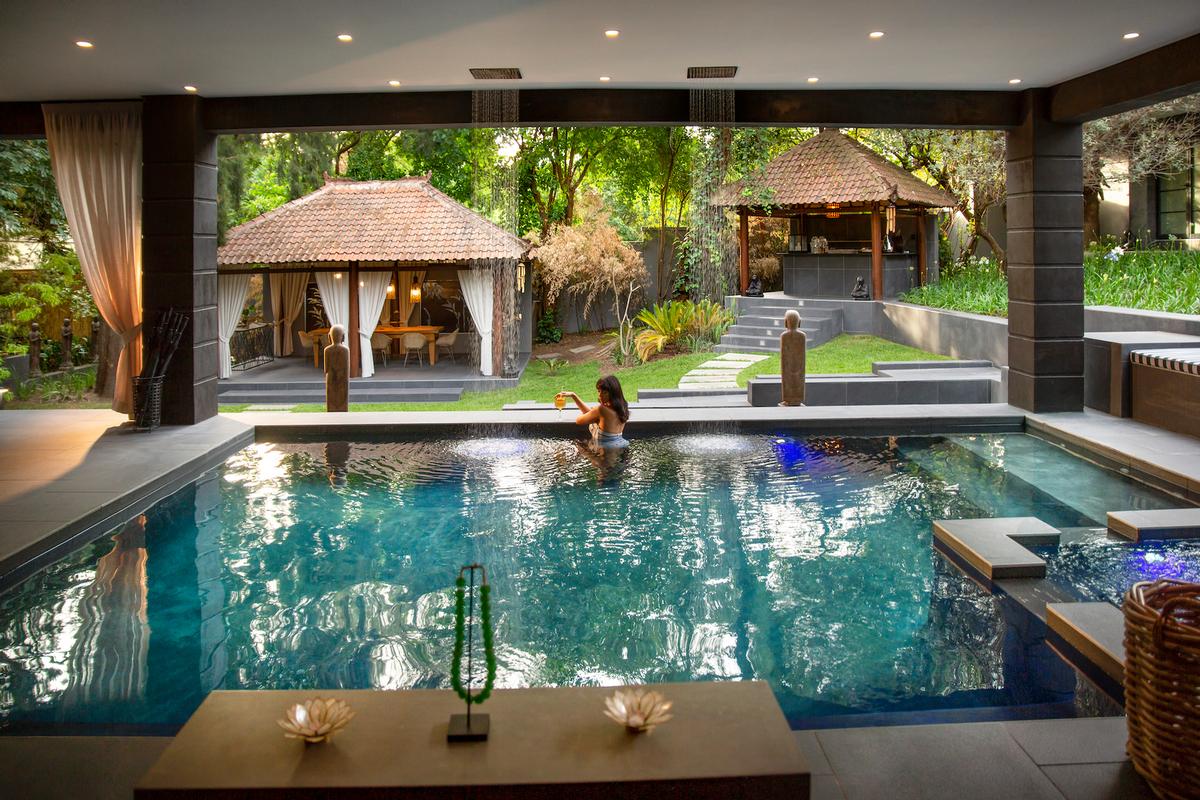 Nestled a bamboo forest within the hotel’s lush gardens, the spa includes a heated plunge pool, Kneipp therapy offering and spa bath, Chinese daybeds and pod swing chairs / 
