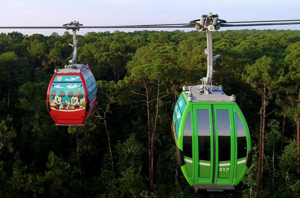 A host of Disney characters are depicted on cable car wraps A host of Disney characters are depicted on cable car wraps