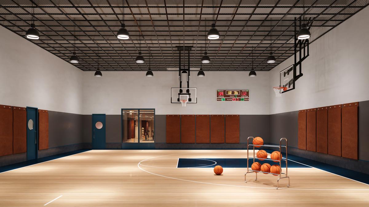 There is a double-height basketball half-court in the Tower / Noe & Associates / The Boundary