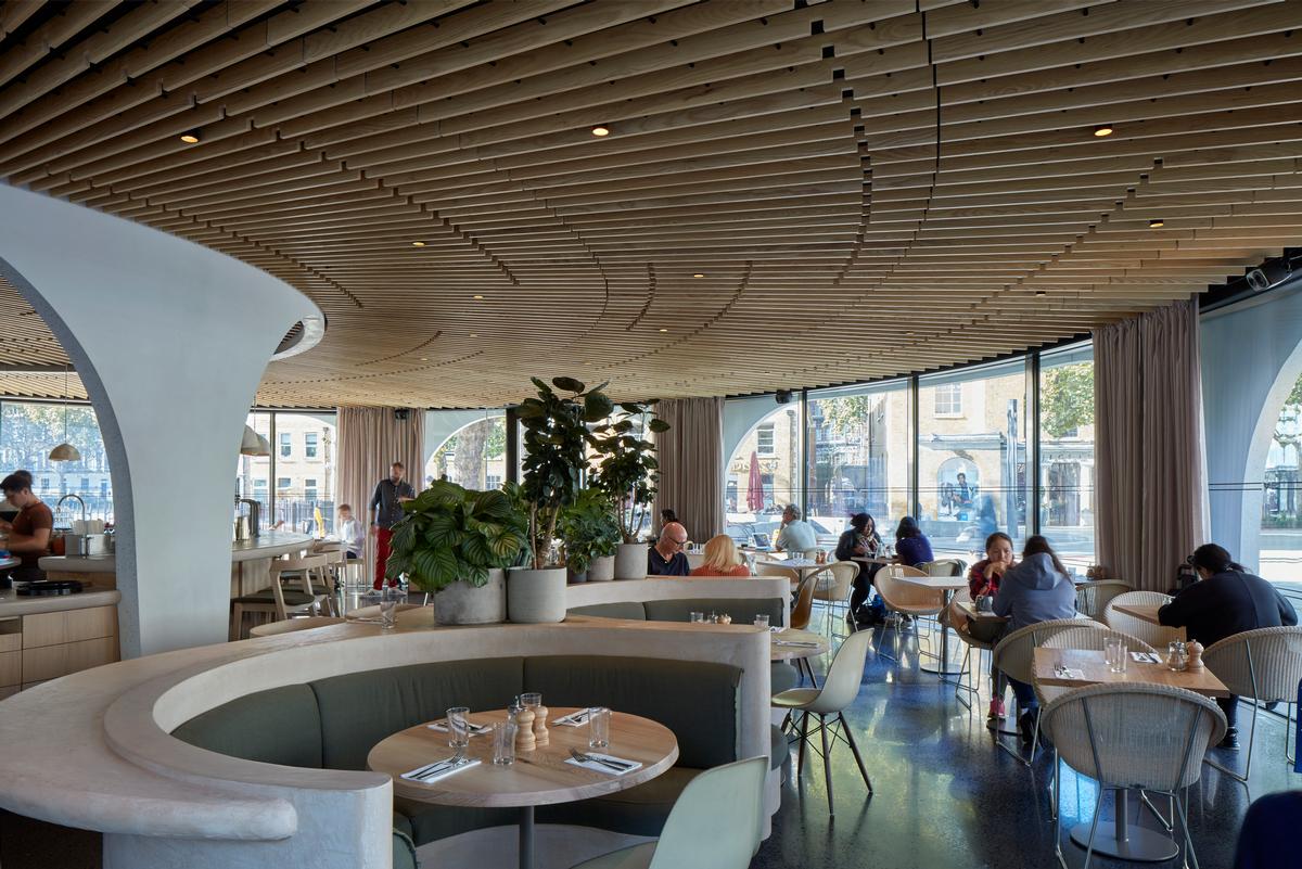 the interior features wooden fixtures, an ash slatted ceiling and terrazzo flooring / James Brittain