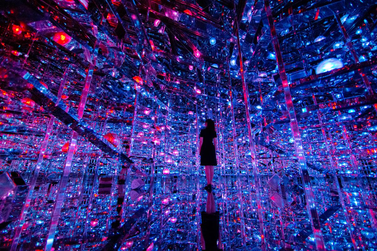 The Microcosmoses installation comprises hundreds of lights that change colour and speed base on the proximity of visitors / Exhibition view of teamLab Borderless Shanghai, 2019, Shanghai © teamLab, teamLab is represented by Pace Gallery