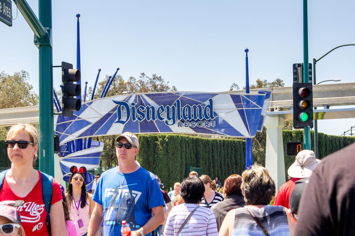 Visitors at Disneyland Resort in Anaheim / Shutterstock