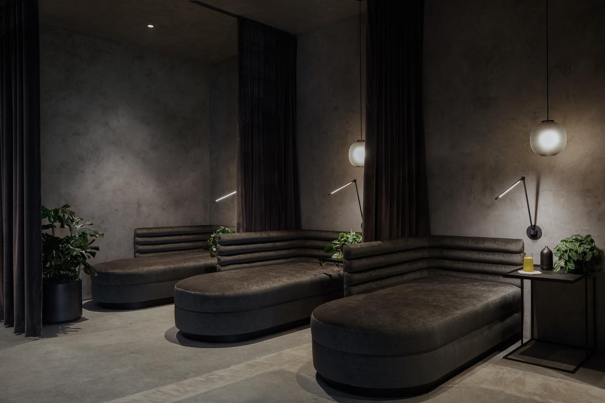 Semi-private IV lounges with luxurious seating provide comfortable spaces for rest and reflection during treatments