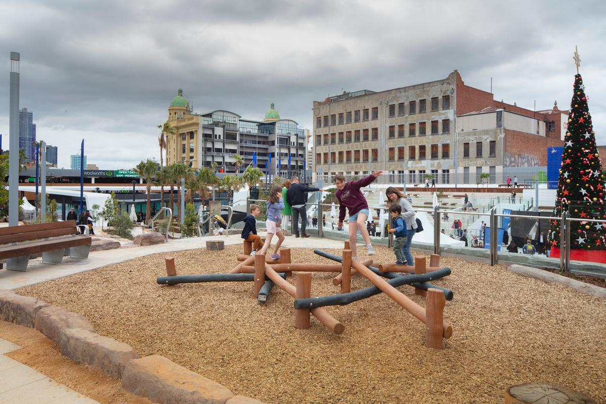 There are activity spaces for children around the square / John Gollings