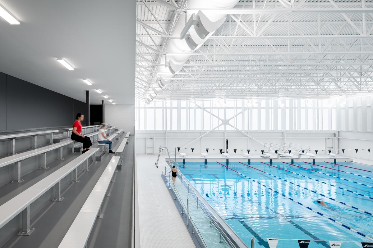 The competition pool features bleacher seating / David Boyer