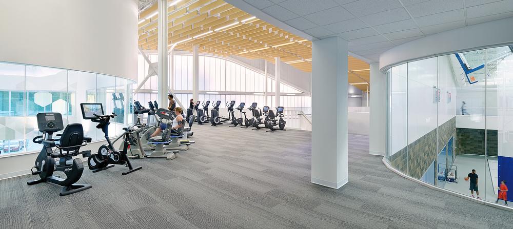 The centre features an 12,800sq ft gym. The curves of the building are echoed in the interior / Photo: Gayle Babcock - Architectural Imageworks