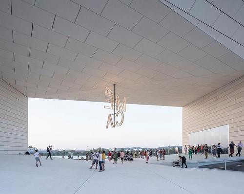 A series of steps and ramps lead the public directly into the 1,100 m2 outdoor urban room at the core of MÉCA / BIG