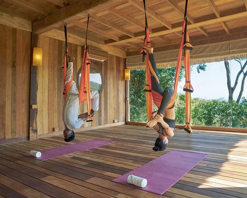 Flying yoga improves flexibility and balance and gives guests the unique sensation of flying