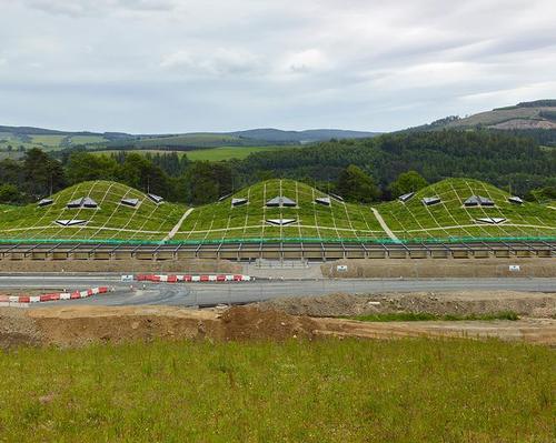 The Macalan: The distillery takes its cues from ancient Scottish earthworks. The undulating roof is planted with a Scottish wildflower meadow and rises and falls over the production cells beneath / Mark Power