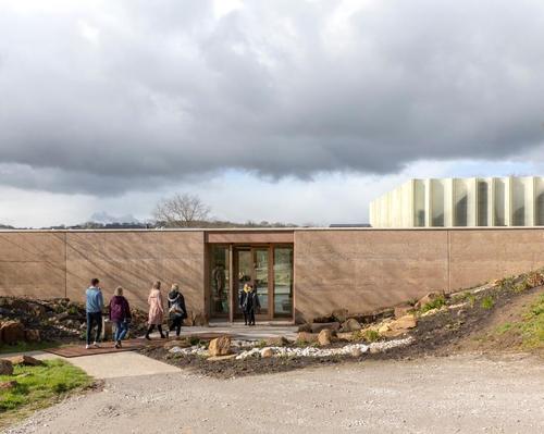 The Weston: The visitor centre's walls are constructed from layered pigmented concrete / Peter Cook