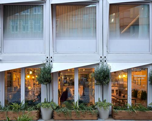 A façade of projecting fins contributes to privacy and solar-shading / Edmund Sumner